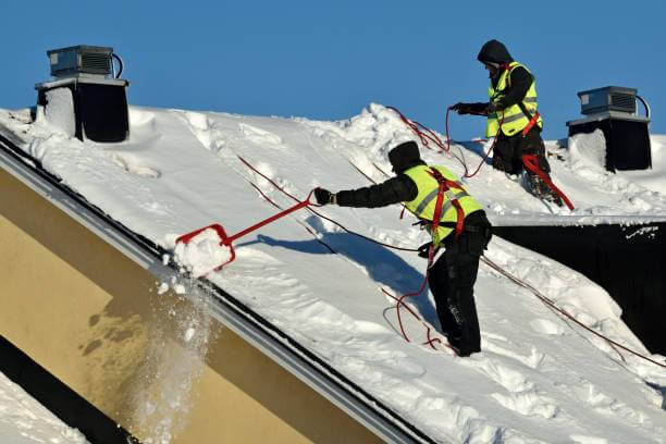 How Do Roofers Work in Snowfall