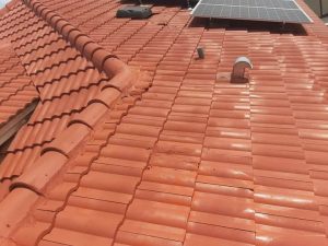 How to Paint a Metal Roof with a Roller